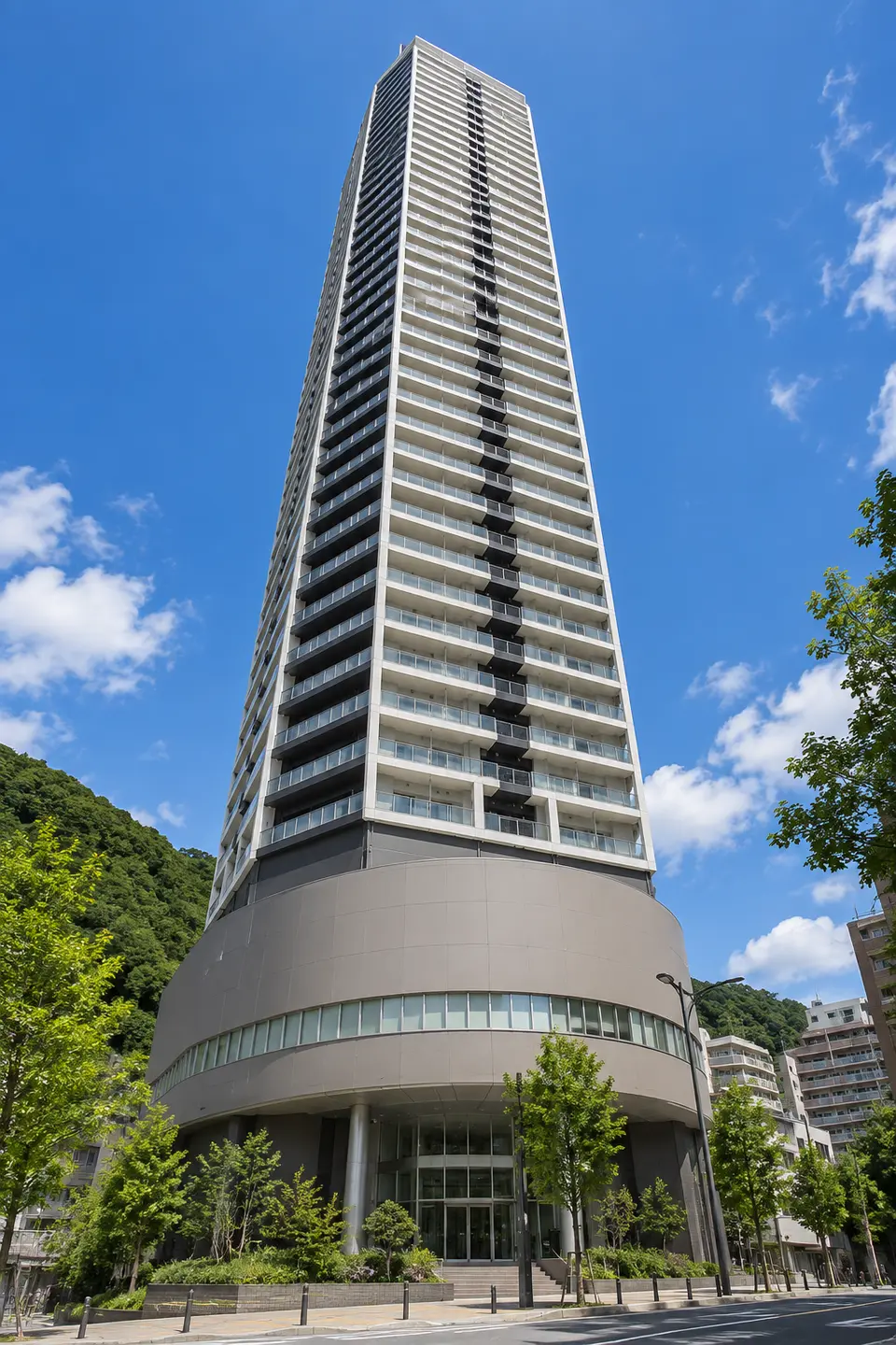 Generated illustration (not the actual building) of JIKUREFUSHINKOBE TOWER