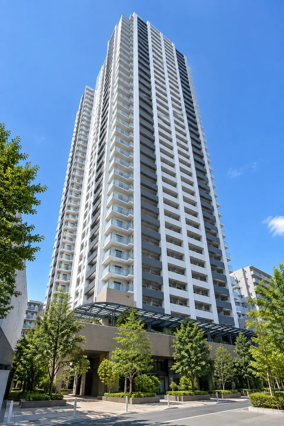 Generated illustration (not the actual building) of BINASHISUKEISEIKANAMACHI TOWER RESIDENCE
